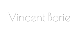 Vincent Borie | Signature visuelle moderne et élégante Nom "Vincent Borie" écrit en caractères gris clair et fins sur un fond noir uni, dans une police moderne et élégante.